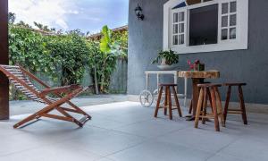 Casa com churrasqueira e jardim perto da praia