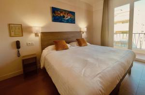 Hotels Hotel Courbet : photos des chambres