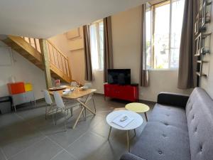 Appartements Les logis des Vignobles Sainte Emilion en Duplex n 3 avec terrasse : photos des chambres