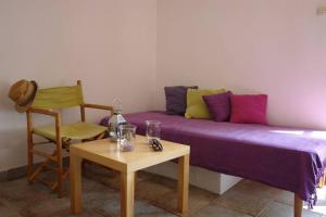 A small stone house by the sea, in a wineyard