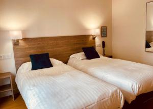 Hotels Hotel Courbet : photos des chambres