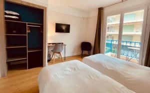 Hotels Hotel Courbet : photos des chambres
