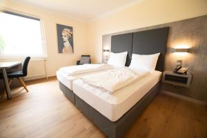 Double Room room in Das Reinisch Just Rooms