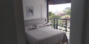 Uma quadra da praia - Vista para o Mar - Guaratuba - AC e Wi-Fi