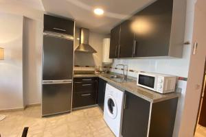 Moderno Apartamento en primera linea de playa con terraza y vistas al mar- Caleta del Puerto