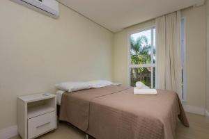 Porto Fino 106 – Lindo Apartamento no Centro de Bombinhas, a 260 Metros da Praia, com Ótimo Custo-Benefício.