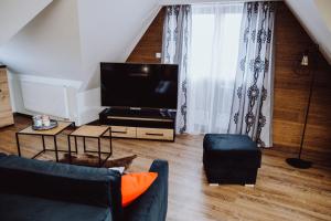 Apartament na poddaszu f13 na terenie ośrodka sunsnow