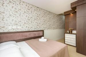 Boulevard 211B - Excelente apartamento em condomínio de luxo no centro de Bombinhas - Piscina - Jacuzzi - Academia - Portaria 24h.