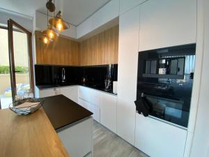 Luxurious and panoramic apartments at the beach in La Mer complex