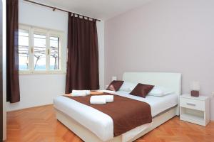 Two-Bedroom Apartment room in Apartments by the sea Pisak Omis - 18141