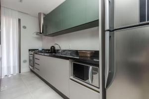 Porto Madero 301 – Apartamento Moderno em Condomínio com Piscina e Academia no Rooftop no Centro de Bombinhas.