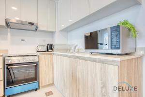 Chic 1BR in Town Square UNA Dubailand by Deluxe Holiday Homes