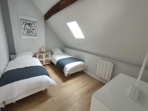 Appartements Les Charmilles : photos des chambres