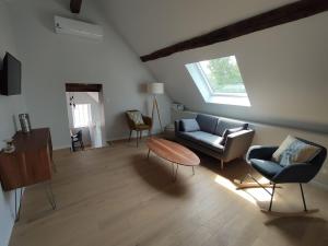 Appartements Les Charmilles : photos des chambres