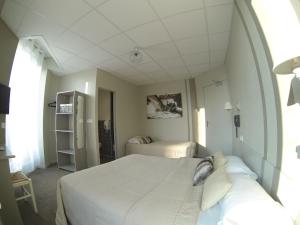 Hotels Cit'Hotel Les Alizes : photos des chambres