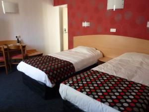 Hotels Cit'Hotel de La Vallee : photos des chambres