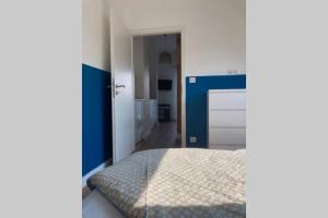 Appartements CosyBNB bleu, logement independant, wifi, parking, petit dejeuner : photos des chambres