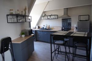 Appartements Les Mansardes du centre ville ,vue Loire : photos des chambres