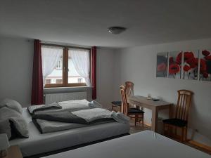 Gästehaus Apartments B & B27 und Pension Waldhorn