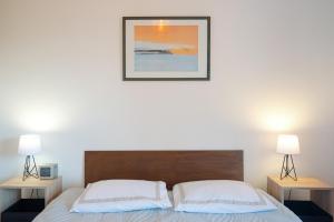 Appartements Les Jasmins Apartment : photos des chambres