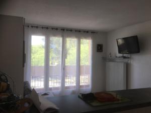 Appartements studio lumineux avec terrasse : photos des chambres