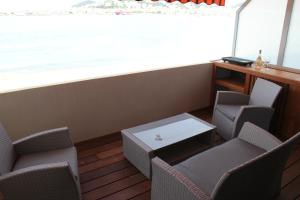 Appartements studio pieds dans l’eau : photos des chambres