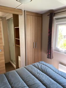 Campings mobilhome O103 et O104 : photos des chambres