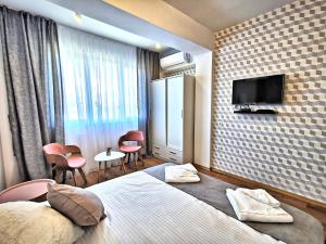 Guest rooms Denicija