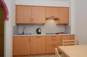 Two-Bedroom Apartment with Balcony room in Appartamenti Maria