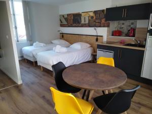 Appartements Malicorn' Appart-Hotel : photos des chambres