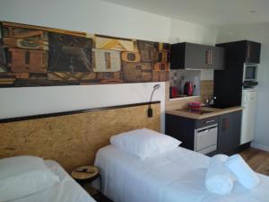 Appartements Malicorn' Appart-Hotel : photos des chambres