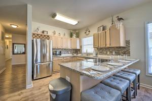 Carolina Beach Condo with Deck Steps to Shore!