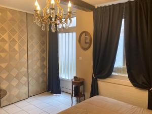Appartements LE TOUT JOLI NID BEAUNOIS, Studio Plein centre parking : photos des chambres