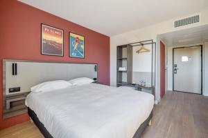 Hotels Kyriad Bordeaux Nord Sainte Eulalie : photos des chambres