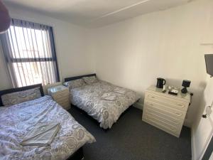 Triple Room with Private Bathroom room in The Honley hotel
