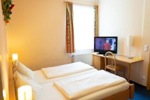 Family Suite with Balcony room in Strandhotel Burgstaller