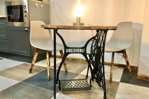 Appartements Studio cocooning Spa, lit XXL, cour exterieure : photos des chambres