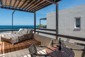 Family Maisonette Sea Front room in Corinna Mare