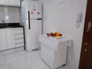 Ensolarado ao lado do shopping com garagem e Wifi