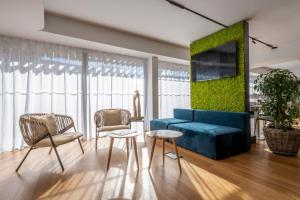 Appart'hotels ATHOME RESIDENCE ET SPA : photos des chambres