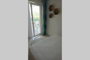 T2 climatisé à 5 minutes à pied de la plage avec parking, piscine et wifi