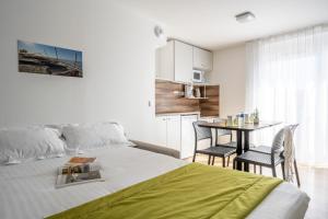 Appart'hotels ATHOME RESIDENCE ET SPA : photos des chambres