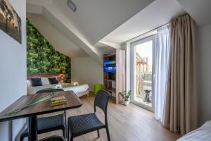 Appart'hotels ATHOME RESIDENCE ET SPA : photos des chambres