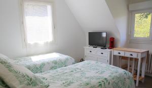 B&B / Chambres d'hotes Aux Arbres Chanteurs : photos des chambres