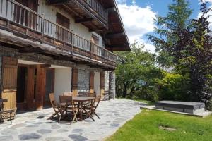 Chalets Paisible chalet montagne avec option jacuzzi : photos des chambres