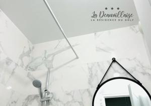 Appartements La Deauvillaise - Residence du Golf : photos des chambres