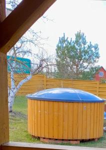 Žalioji stotelė butiko namukas dviems