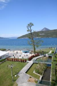 Appartements Logement atypique avec vue unique panoramique sur le lac d’Annecy, dans une residence avec plage et ponton privee sur la commune de Duingt (Rive gauche du lac). : photos des chambres