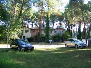 Maisons de vacances Jolie petite maison a Vieux Boucau avec piscine chauffee - Domaine du Golf de Pinsolle : photos des chambres