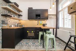 Central designer studio by beautiful park & church